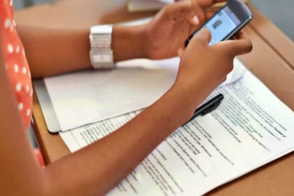 Enter the Group-4 exam hall with a cell phone